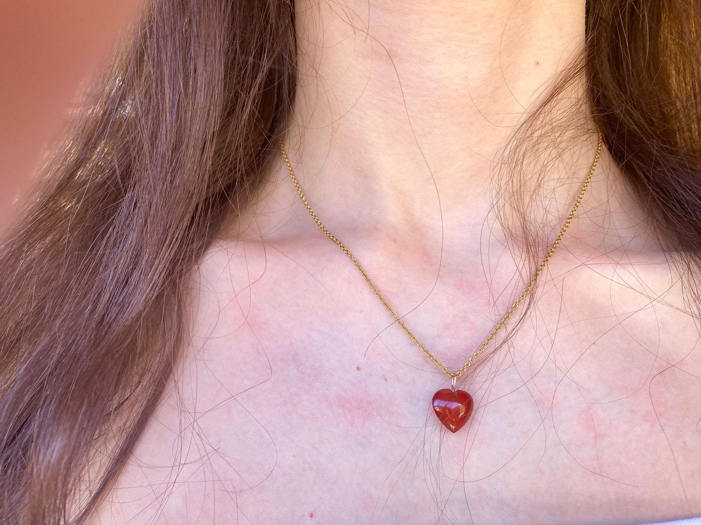 Collana dorata con cuore in corniola